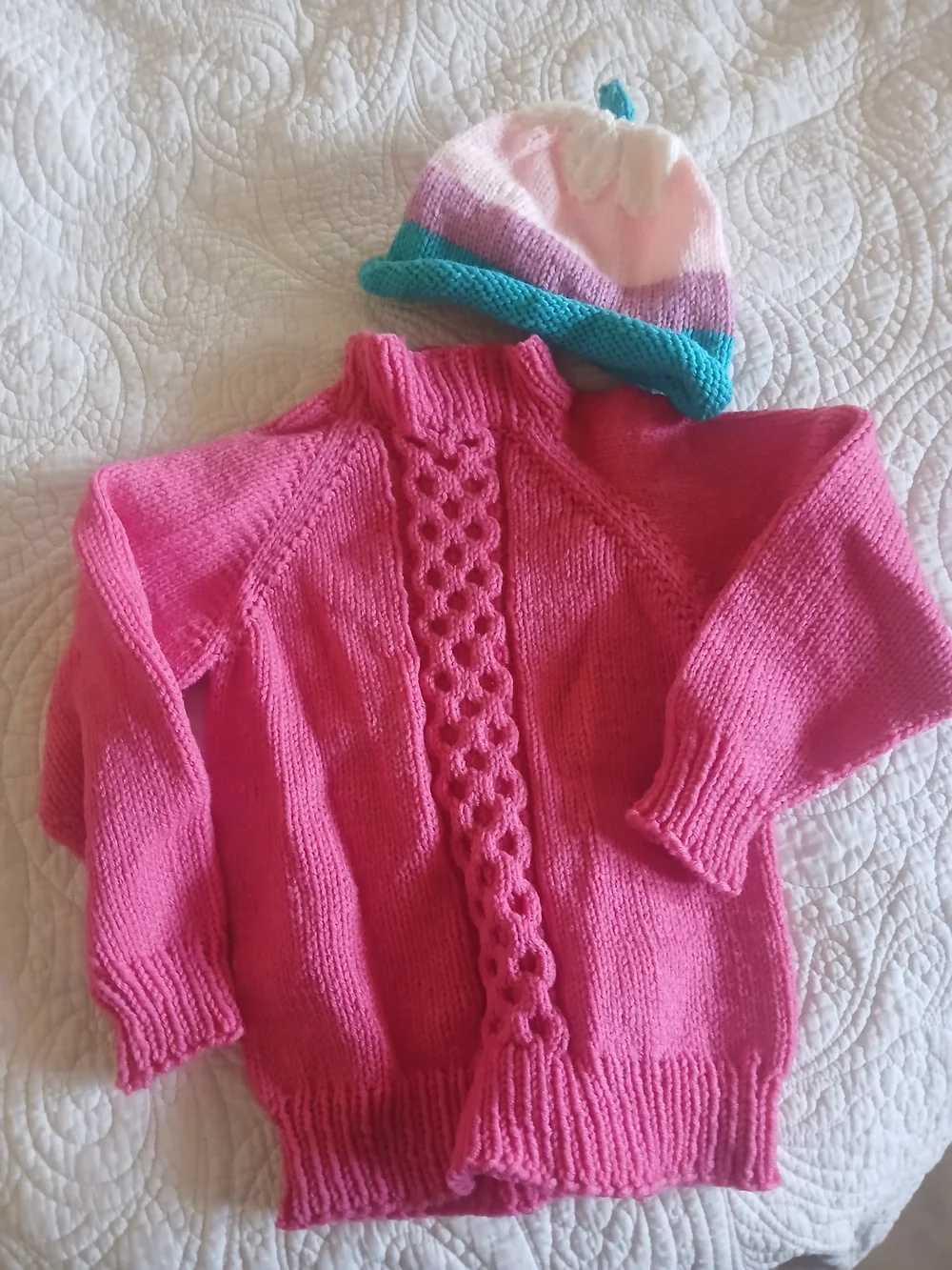 Various handknit toddler winter wear